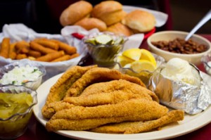 EATS Catfish Sam’s does catfish right — along with hush puppies and fried pickles. Tony Robles