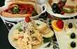 Z’s Salad Trio (center), roast beef hoagie, and chicken salad sandwich — with fresh lemon and key-lime tarts — make for an appealing invitation. Lee Chastain