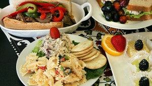 Z’s Salad Trio (center), roast beef hoagie, and chicken salad sandwich — with fresh lemon and key-lime tarts — make for an appealing invitation. Lee Chastain