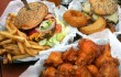 The headlining Bronson Burger, the Yard Bird, and some rings and wings are the stars at Bronson Rock. Lee Chastain