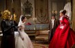 Lily Collins faces off with Julia Roberts with Nathan Lane looking on in Mirror Mirror.