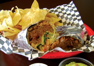 EATS You’ll need a knife and fork to get at Mojo’s pulled pork burrito. Bonnie Mays