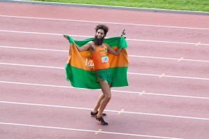 FILM Sacha Baron Cohen does a victory dance with his nation’s flag in The Dictator.