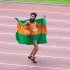 Sacha Baron Cohen does a victory dance with his nation’s flag in The Dictator.