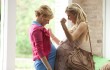 Elizabeth Banks and Brooklyn Decker bump baby bumps in "What to Expect When You're Expecting."