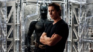 Christian Bale ponders the end of Batman in The Dark Knight Rises.