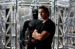Christian Bale ponders the end of Batman in The Dark Knight Rises.