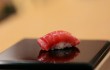 A piece of chu-toro (medium tuna) nigiri prepared by Jiro Ono in "Jiro Dreams of Sushi."