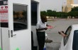 Standard Parking employees collect parking fees on city lots in the Cultural District. Jeff Price