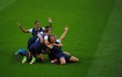 The U.S. women's soccer team celebrates after their first goal in the 2012 Olympic final.