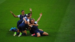 The U.S. women's soccer team celebrates after their first goal in the 2012 Olympic final.
