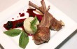 The Australian lamb chops with risotto and blueberry chutney are popular at The Wild Mushroom. Lee Chastain