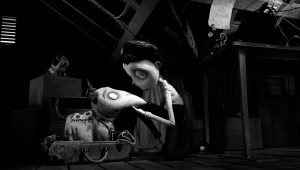 What's a Tim Burton movie without an attic? Young Victor Frankenstein curls up with a resuscitated Sparky in "Frankenweenie."