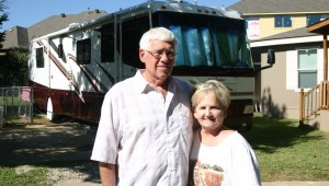 Richard and Ginger Moore are living in the recreational vehicle behind them. Jeff Prince