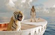 A Bengal tiger and Suraj Sharma must share a boat to survive in "Life of Pi."