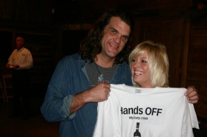scott carol SCOTT COPELAND AND GIRLFRIEND CAROL PATE CHECK OUT A PROMOTIONAL T-SHIRT AT LAST NIGHT'S SCREENING OF "THE TEXAS MUSIC HOUR WITH BRAD HINES."