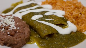 Los Paisanos’ chicken enchiladas are simple and tasty. Chase Martinez