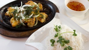 Bamboo does more than pho and spring rolls, including this turmeric-marinated catfish with traditional fixins. Chase Martinez