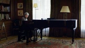 Emmanuelle Riva plays piano in her home before illness strikes in Amour.