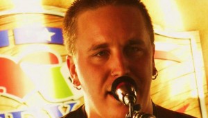 PHIL WALLACE AND HIS FRESHLY SHORN LOCKS CAME JUST SHY OF WINNING THE 3RD ANNUAL RUSTY WIER SONGWRITING CONTEST ON SUNDAY IN DALLAS. (facebook photo courtesy of Phil Wallace)