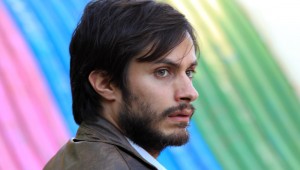Gael García Bernal poses in front of his ad campaign’s rainbow flag in No.