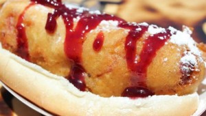 The Monte Cristo dawg is deep-fried with ham and Swiss cheese and topped with a raspberry horseradish sauce.