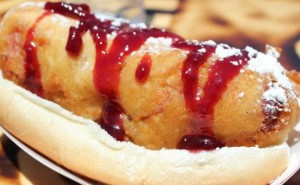 Joe The Monte Cristo dawg is deep-fried with ham and Swiss cheese and topped with a raspberry horseradish sauce.