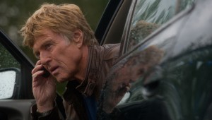 Robert Redford makes a phone call before the cops can trace his signal in The Company You Keep.