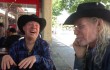 Bill Werngren (left) and James Michael Taylor hang out in the Stockyards. Courtesy Jeannette Stewart