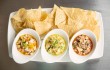 Waters’ ceviche trio, with shrimp, striped bass, and ahi tuna, awaits. Adrien P. Maroney
