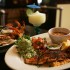 Don Mario’s serves up their Ultimate Fajitas (left) and a platter of catfish and shrimp. Lee Chastain