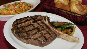 The steaks are cut on-site — and then cooked to order, like this bone-in rib-eye. Lee Chastain