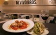 Funky and chunky: DeVivo’s spaghetti and meatballs keep company with a stuffed artichoke. Lee Chastain