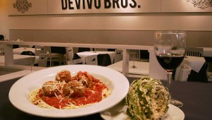 Funky and chunky: DeVivo’s spaghetti and meatballs keep company with a stuffed artichoke. Lee Chastain