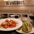 Funky and chunky: DeVivo’s spaghetti and meatballs keep company with a stuffed artichoke. Lee Chastain