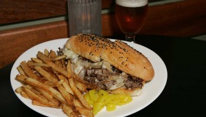 The Live Oak’s shaved rib-eye sandwich is “terrific all around.” Lee Chastain