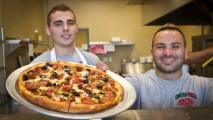 Chelsea owner Kevin Bellomo and co-worker Tim Jonuzi have got your pie right ’eeere! Tony Robles