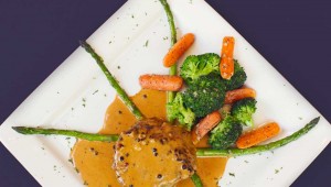 Macaluso’s takes a semi-nontraditional approach to Italian cuisine, as this filet with peppercorn sauce and asparagus clearly shows. Adrien P. Maroney