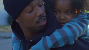 Michael B. Jordan gives Ariana Neal a piggyback ride in Fruitvale Station.