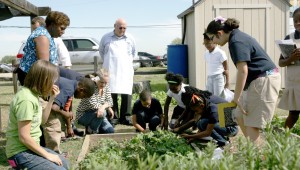 Students at T.A. Sims Elementary School tend their garden. Lee Chastain