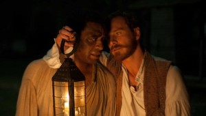 Chiwetel Ejiofor stands up under interrogation by Michael Fassbender in 12 Years a Slave.