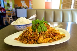 EATS Like everything at First Chinese BBQ, the Hong Kong-style fried squid with rice is hyper-traditional. Vishal Malhotra