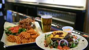 The 7th Street Burger and Eric’s Cheeseburger Salad are just a couple of The Pour House’s funky new offerings. Lee Chastain
