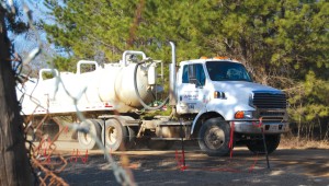 Tanker truck traffic around injection wells is just one of the reasons they’re unpopular with neighbors. Gayle Reaves
