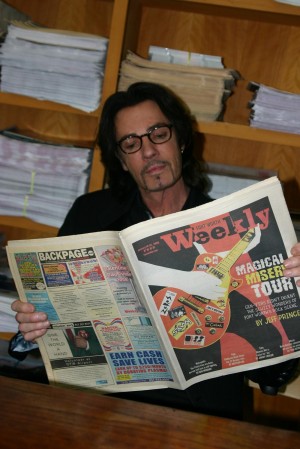 RICK SPRINGFIELD READS AN EXCITING STORY IN FORT WORTH WEEKLY (photo by Jeff Prince)