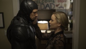 Joel Kinnaman has mixed emotions on his homecoming to Abbie Cornish in RoboCop.