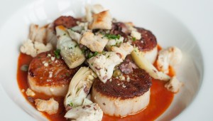 As these seared scallops prove, the food is fresh and inventive at Clay Pigeon. Brian Hutson