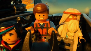 The fellowship of the brick: Wyldstyle, Emmet, and Vitruvius take a ride in the Batjet in The Lego Movie.
