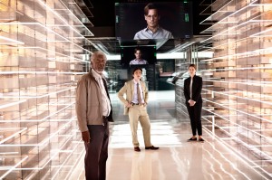 FILM Johnny Depp (on monitors) welcomes Morgan Freeman, Cillian Murphy, and Rebecca Hall to his afterlife in Transcendence.