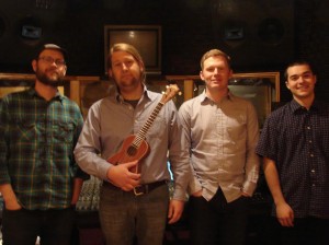 MUSIC With producer Britt Robisheaux (left), Lazy Summer — (from left to right) Jeremiah Kirby, Justin Weisenborn, and Deryck Barrera — are about to release their second album.
